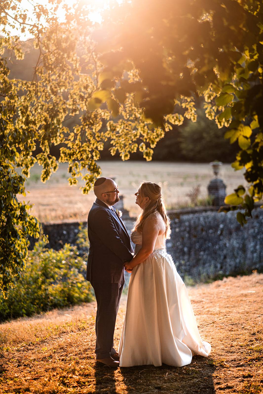 Jewish wedding couple pictures at sunset at Château de Bonnemare.